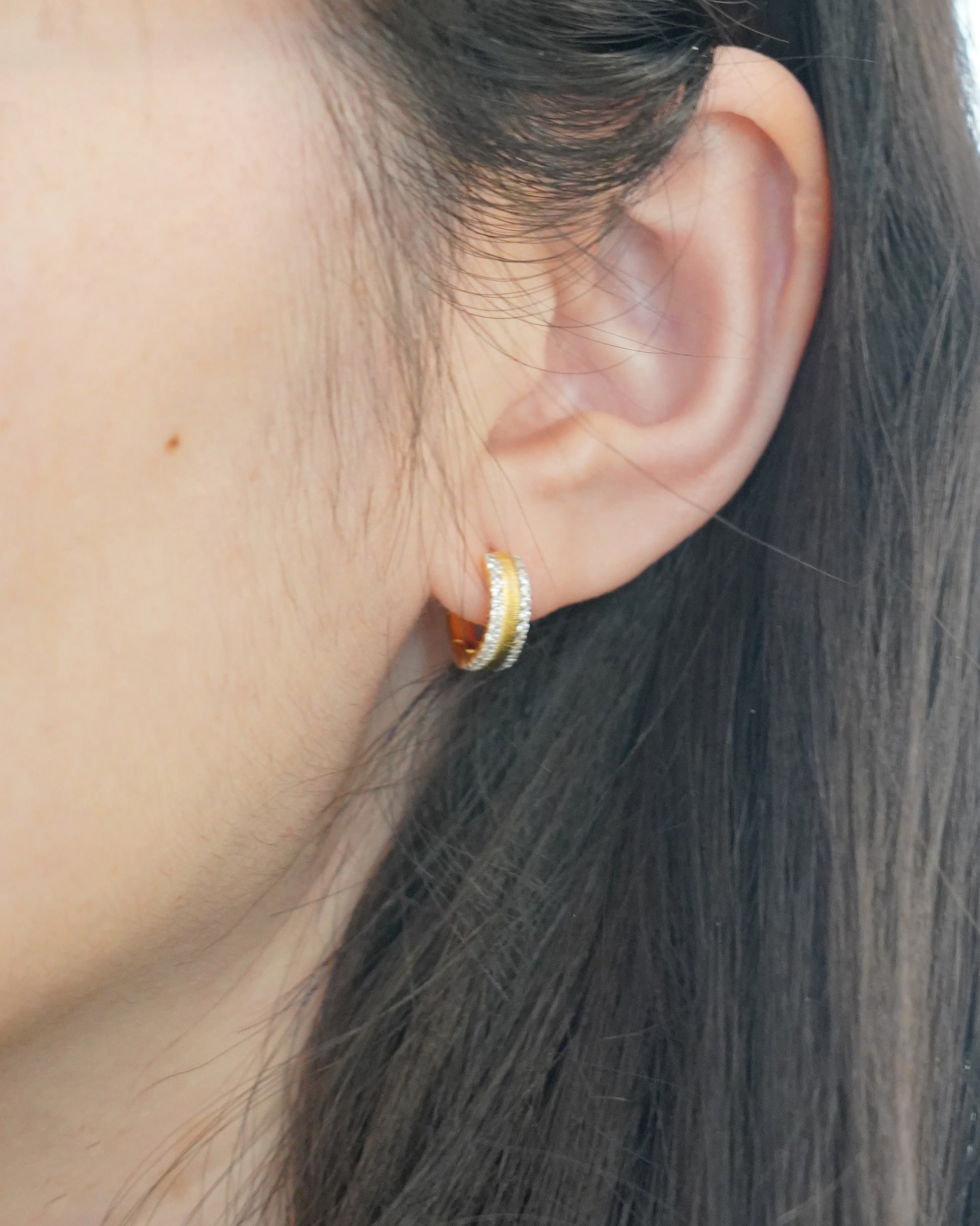 Two-Tone Brushed Gold Huggie Earrings, worn view