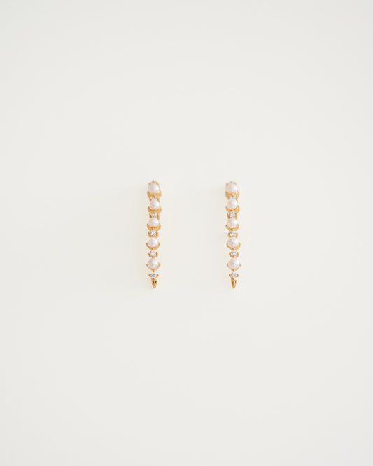 Arc Cascade Pearl Studs, close-up view