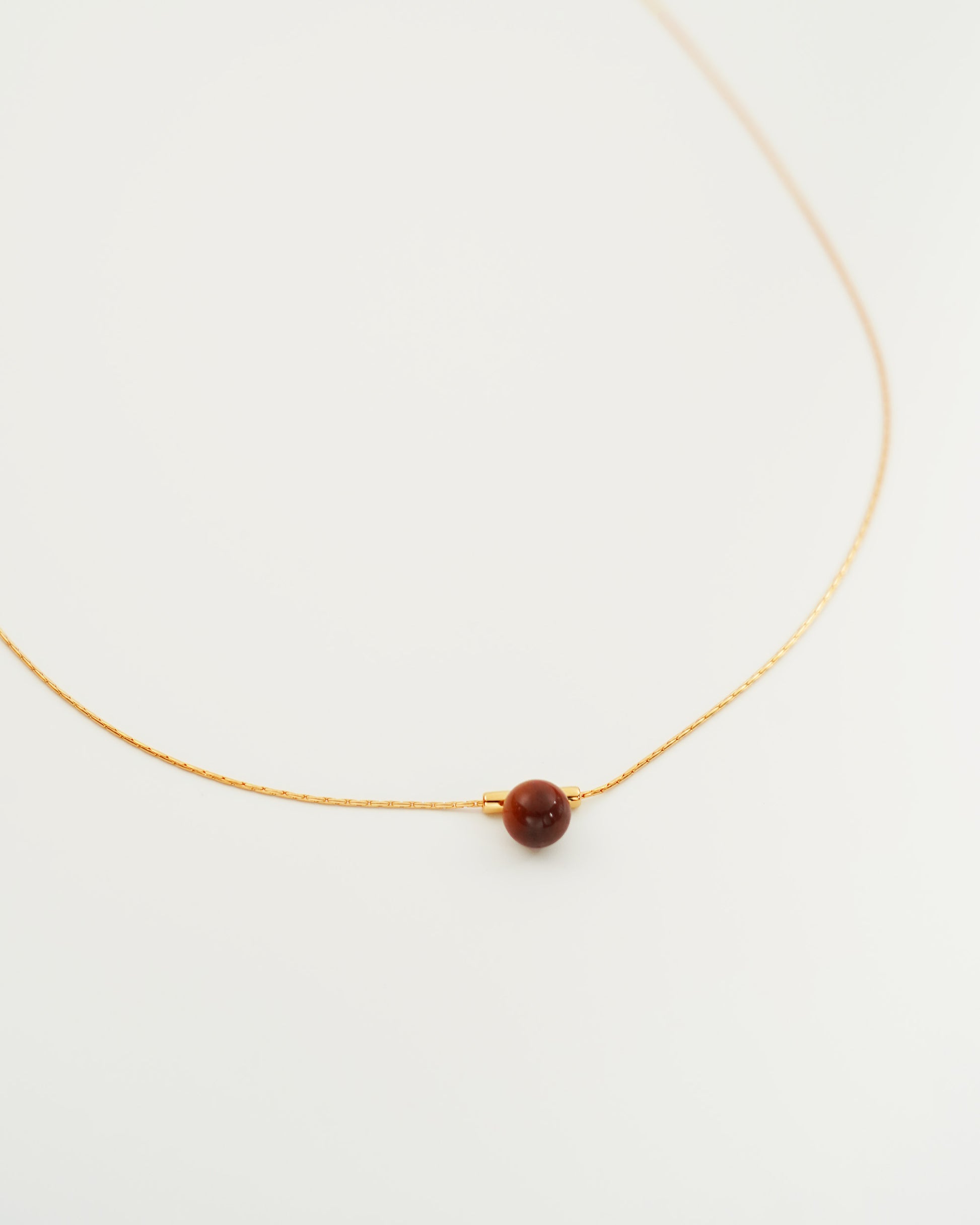 Single Gemstone Necklace in Gold, side view